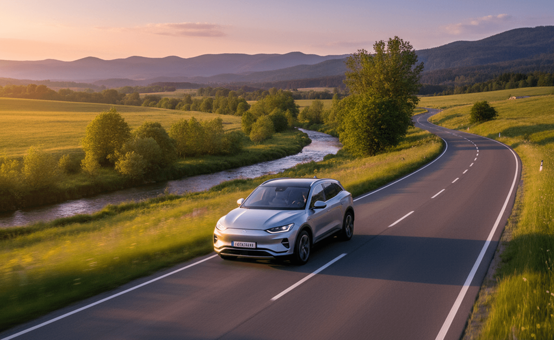 Car driving on road showing importance of proper tire maintenance